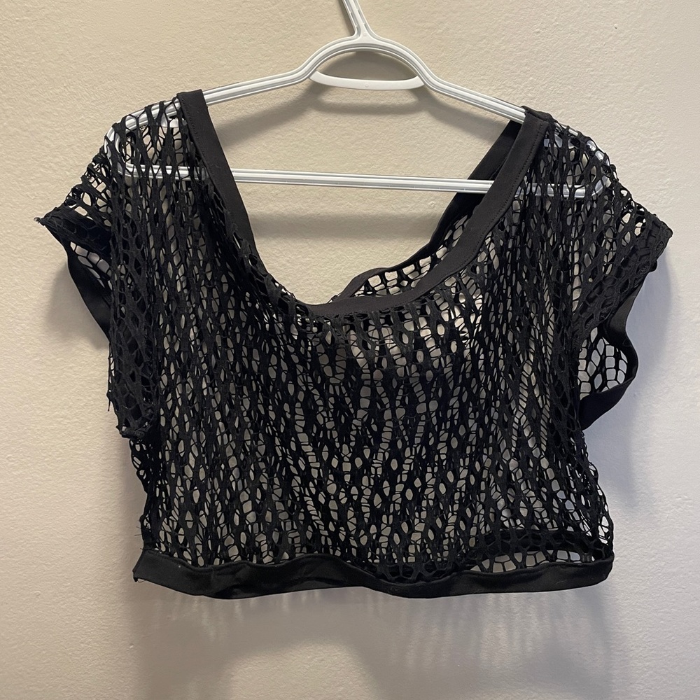 Black net crop top, off shoulder style. Medium, loose fit. Very cute!